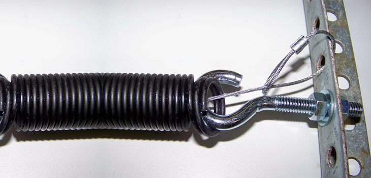 garage door safety spring repair in Carson