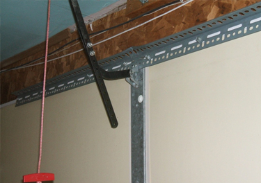 garage door bracket repair in in Carson